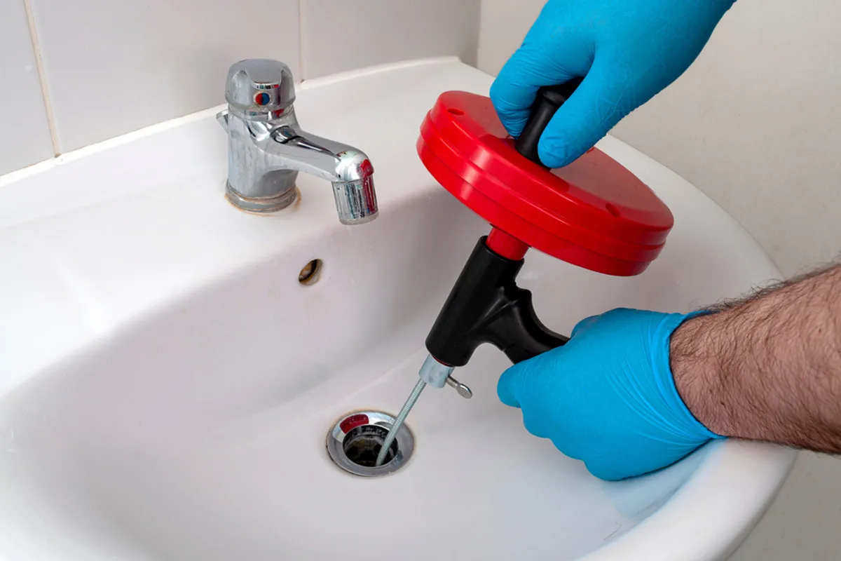 real photo · drain cleaning in progress